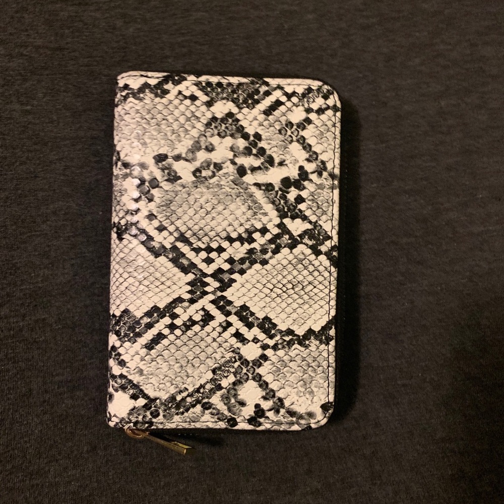 Pleather snake skin pattern wallet.